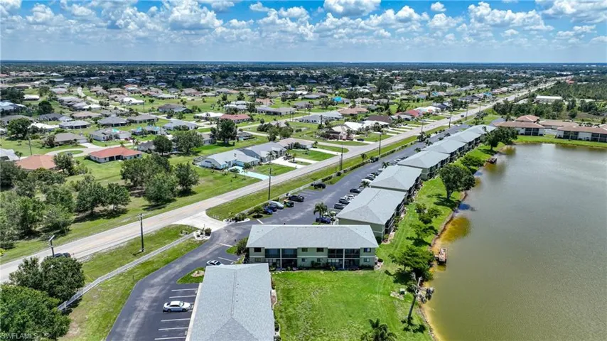 Aerial view of residential area with a large body of water
