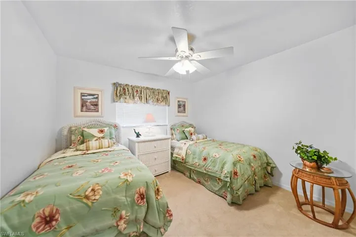 Bedroom with carpet floors and ceiling fan