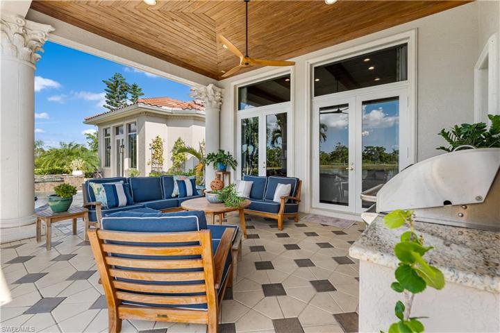 Pecky Cypress wood ceiling on your lanai with a outdoor kitchen with AOG (American outdoor grill), sink. Pavered pattern deck.
