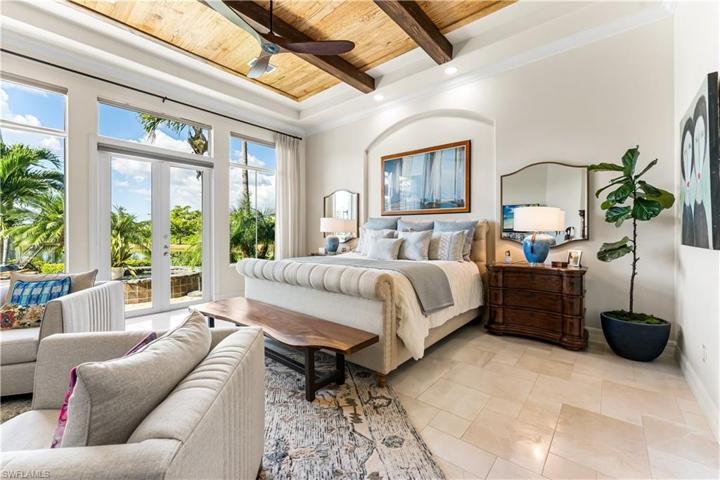 French pattern marble floors, toungue and groove wood ceiling, double french doors give you access to your pool and lanai. Breathtaking views of the lake!
