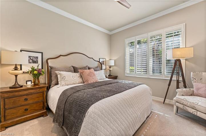 2nd Bedroom offers plantation shutters, crown molding, carpet.