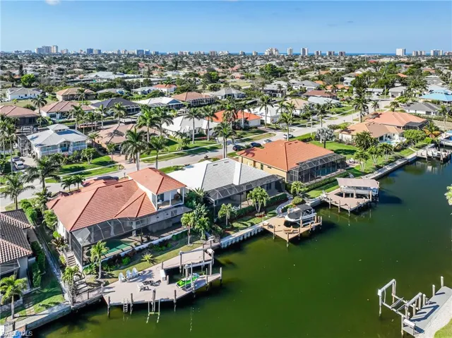 Aerial view with a water view and a residential view