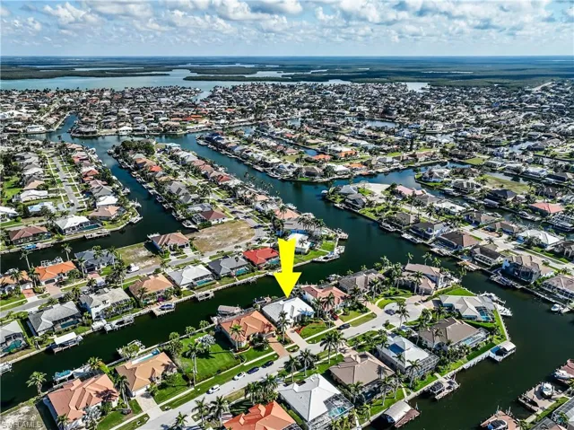 Aerial view with a residential view and a water view