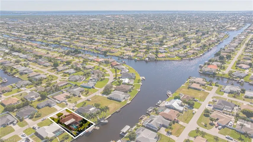 Aerial overview of property's location with nearby suburban area
