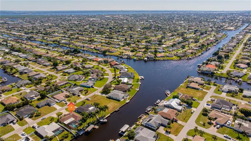 View of property location with nearby suburban area