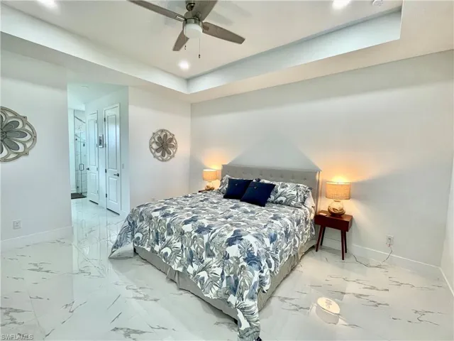 Bedroom featuring ceiling fan