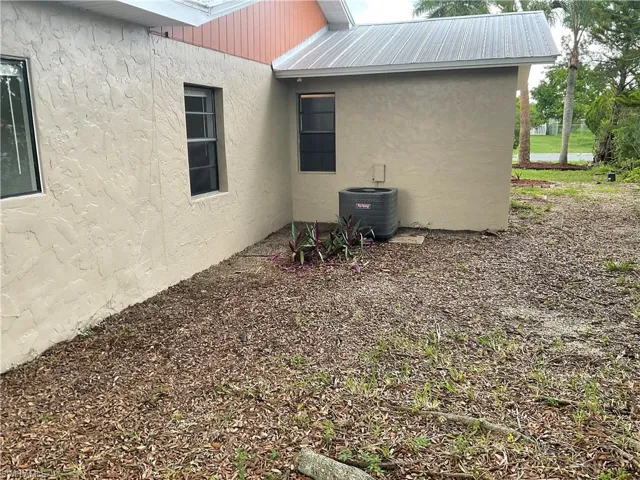 View of property exterior featuring central air condition unit