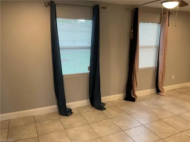 View of tiled spare room
