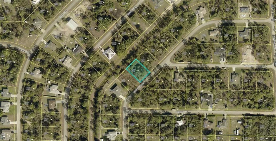 Aerial map of property and surrounding area featuring property parcel outlined