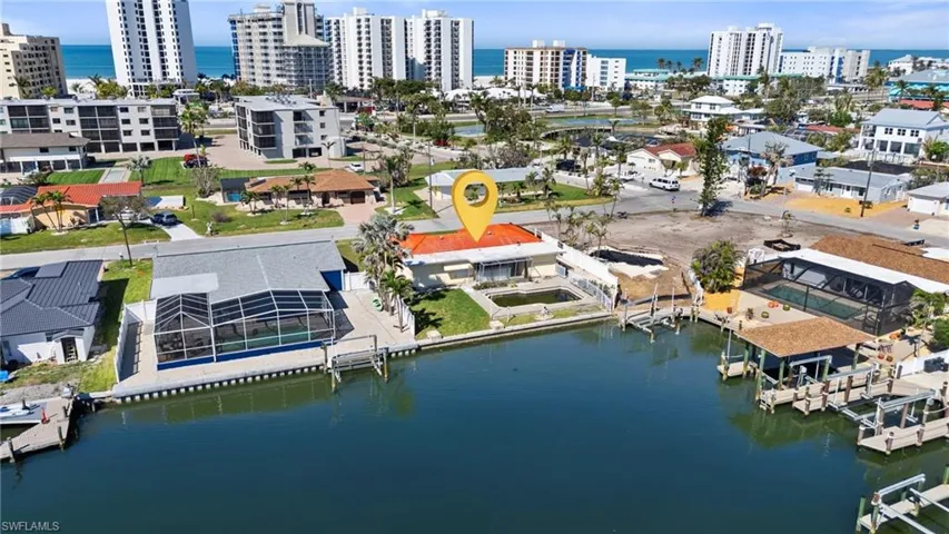 Bird's eye view with a water view and a city view  - Virtually Edited Image