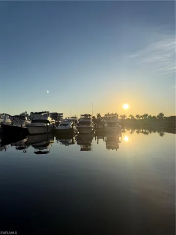 Water view featuring a dock