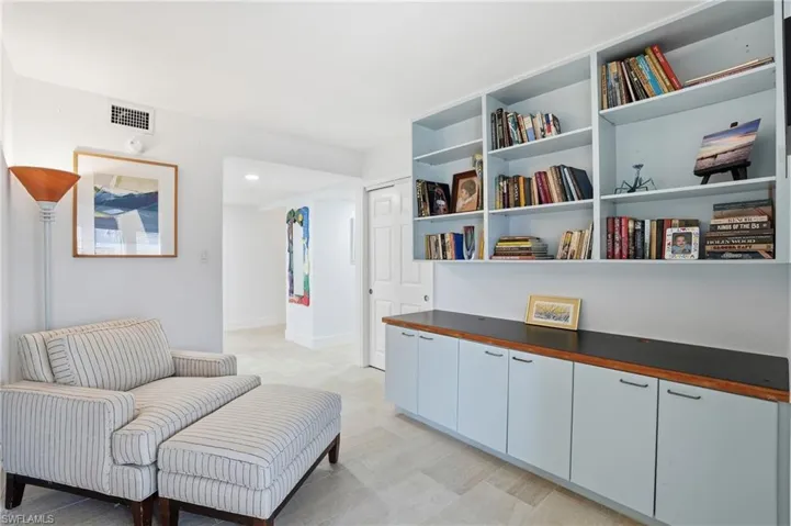 Sitting room with baseboards and recessed lighting - Virtually Edited Image
