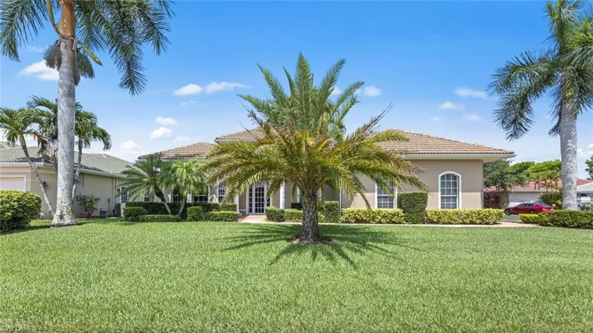 Mediterranean / spanish house featuring a front yard