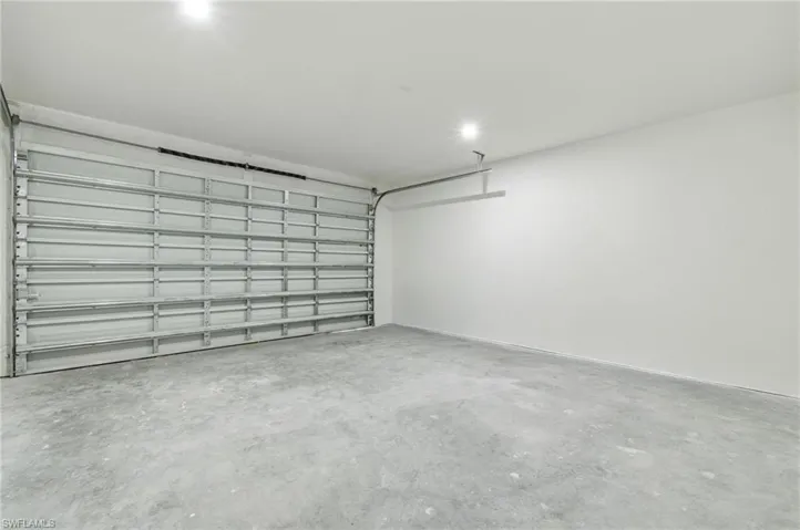Garage featuring recessed lighting