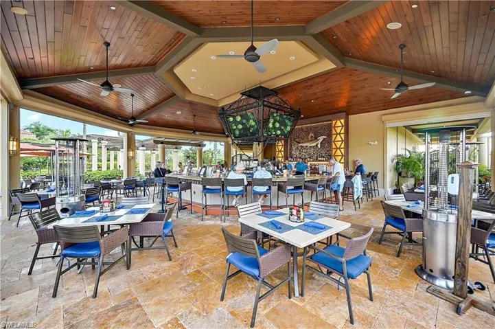 Dining area featuring wooden ceiling and lofted ceiling with beams