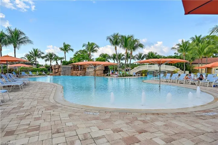 View of swimming pool featuring a patio area and pool water feature