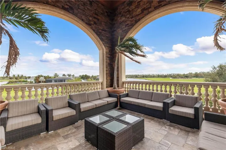 View of patio with an outdoor hangout area