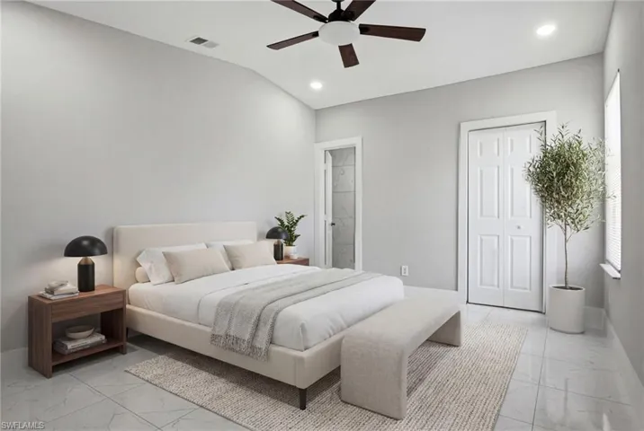 Vaulted ceiling with a contemporary ceiling fan, recessed lighting, and light-toned walls