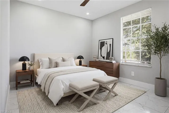 Bedroom featuring large window with horizontal blinds, overhead ceiling fan, recessed lighting, and tile flooring