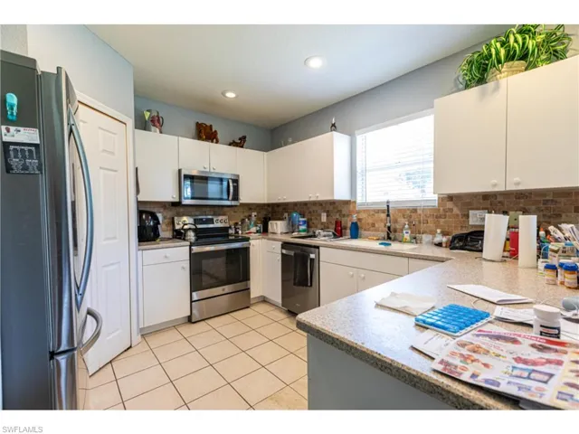 1234 Ravenswood ST E, LEHIGH ACRES FL 33974
