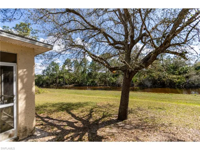 1234 Ravenswood ST E, LEHIGH ACRES FL 33974
