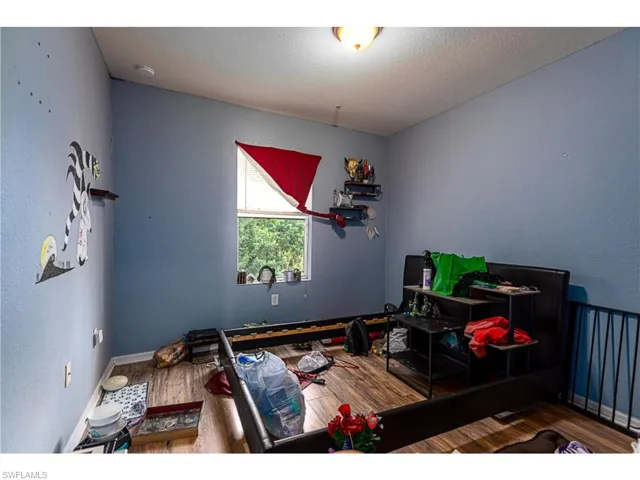 1234 Ravenswood ST E, LEHIGH ACRES FL 33974