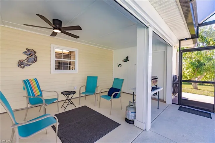 View of patio with ceiling fan