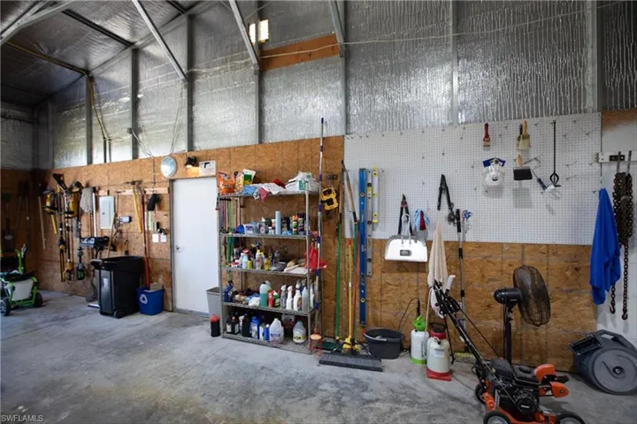 Garage featuring a workshop area