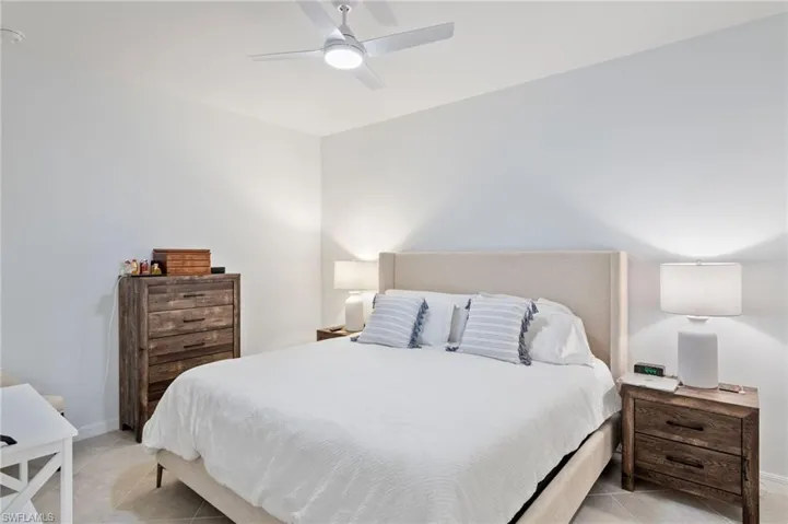 Bedroom featuring ceiling fan and light tile patterned floors
