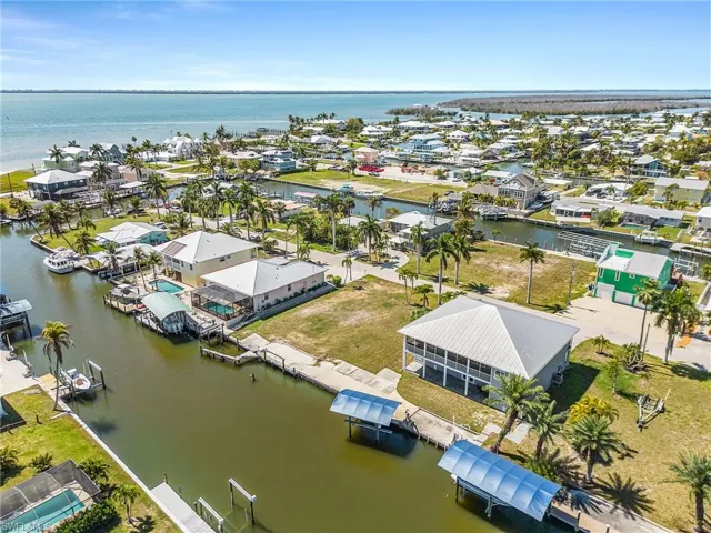 Aerial view of residential area with a nearby body of water