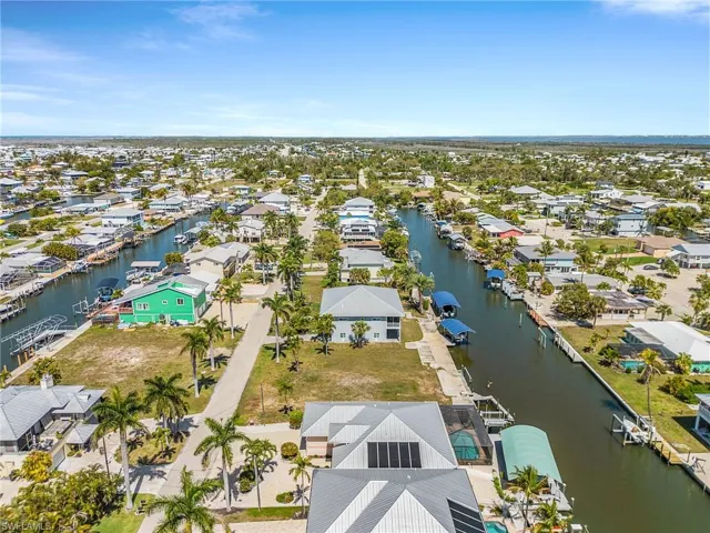 Aerial view of residential area with a large body of water