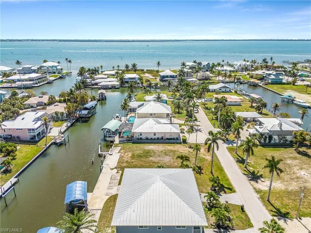 Aerial view of residential area with a nearby body of water