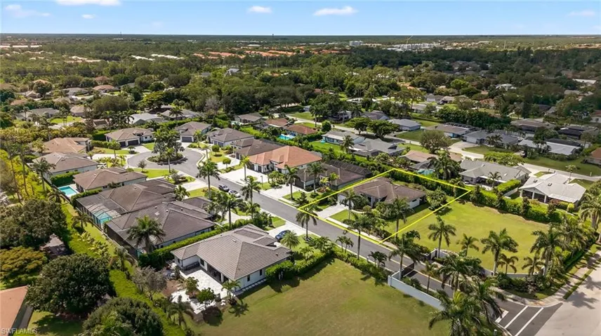 Aerial perspective of suburban area with property boundaries highlighted