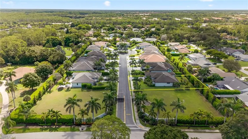 Aerial perspective of suburban area featuring property boundaries highlighted looking from the entrance to Lagacy Estates
