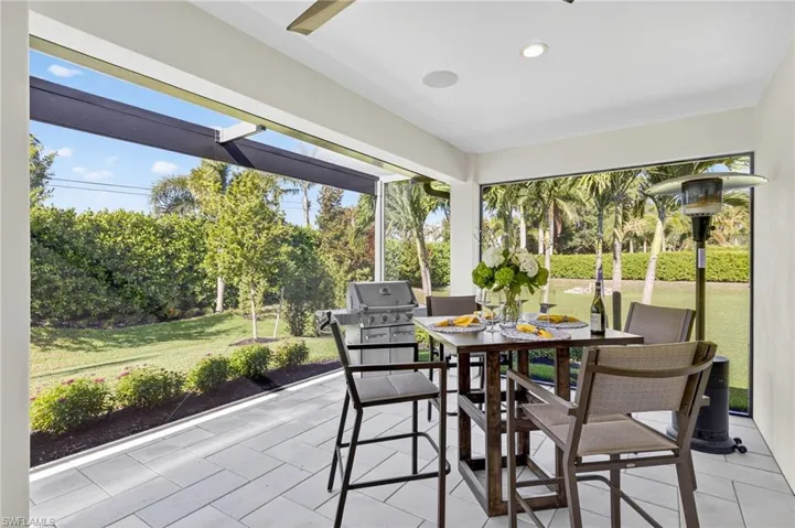 Extended screend lanai featuring recessed lighting, built in speakers, and beautiful sunset views