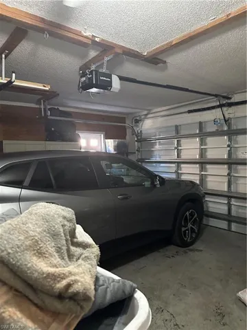 Laundry area with cabinet space and washing machine and dryer