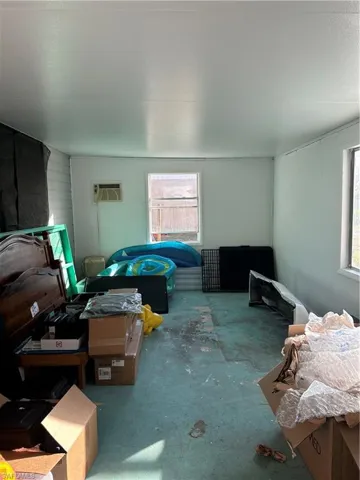Utility room featuring water heater