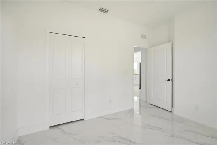Unfurnished bedroom featuring a closet