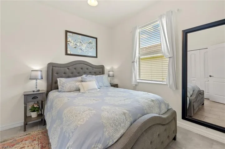Bedroom featuring baseboards