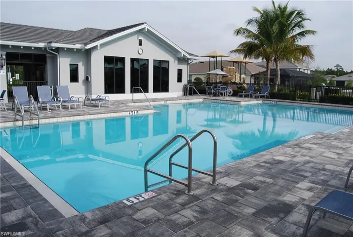 View of community pool & playground