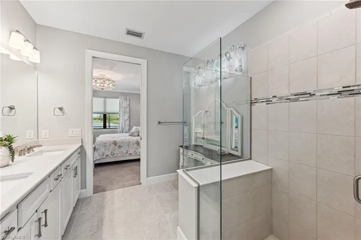 Bathroom with vanity and an enclosed shower