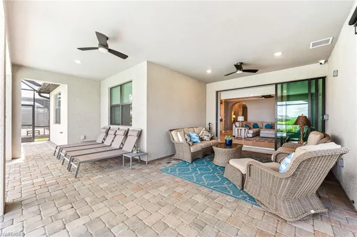 View of patio / terrace featuring ceiling fan and an outdoor hangout area