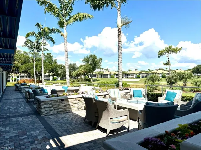 View of patio / terrace with an outdoor fire pit