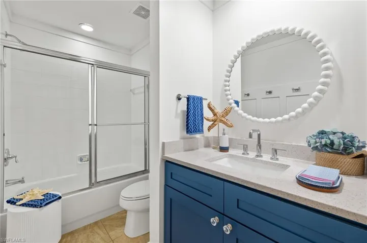 New vanity, quartz counters, sink and faucets.
