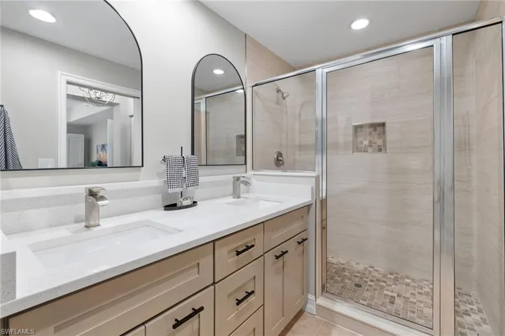 Remodeled shower & newer double sink vanity area