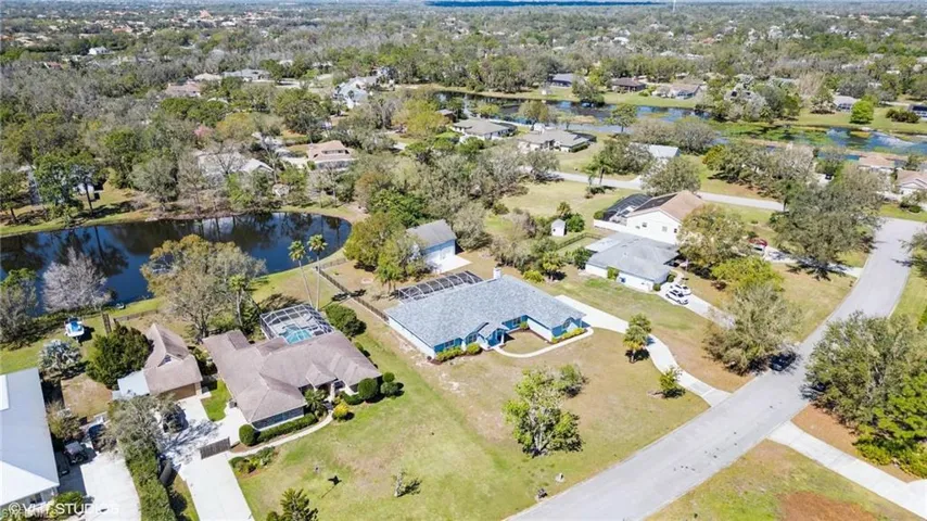 Drone / aerial view featuring a residential view and a water view