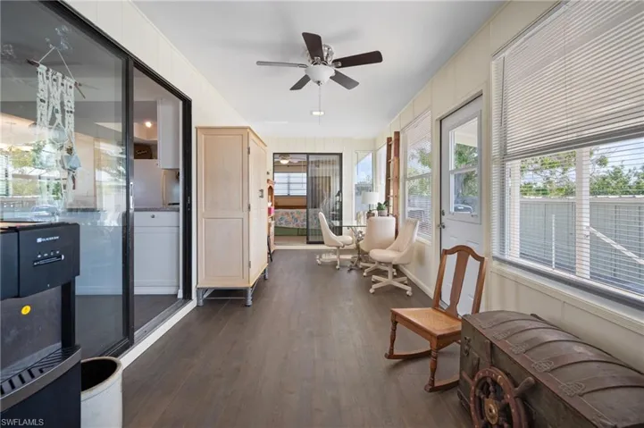 Sunroom featuring wood finished floors