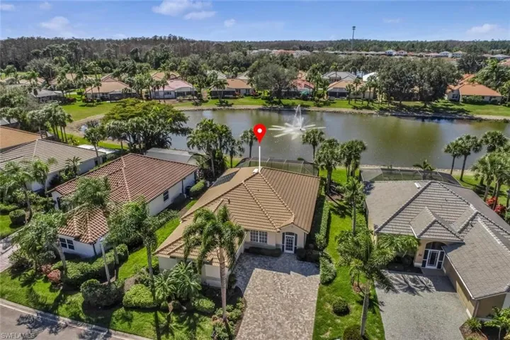 Aerial perspective of home and landscaping.