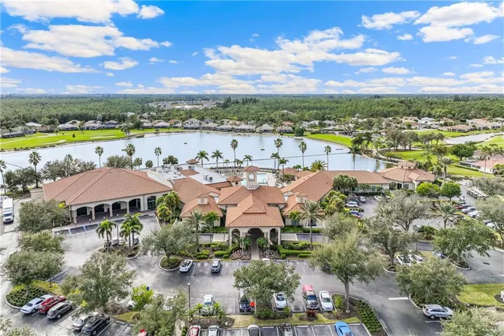 Aerial view with a water view of community clubhouse