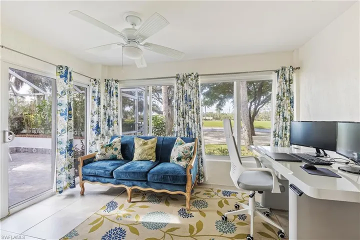 Office/Den/Florida Room with ceiling fan, light tile patterned floors, and a healthy amount of sunlight